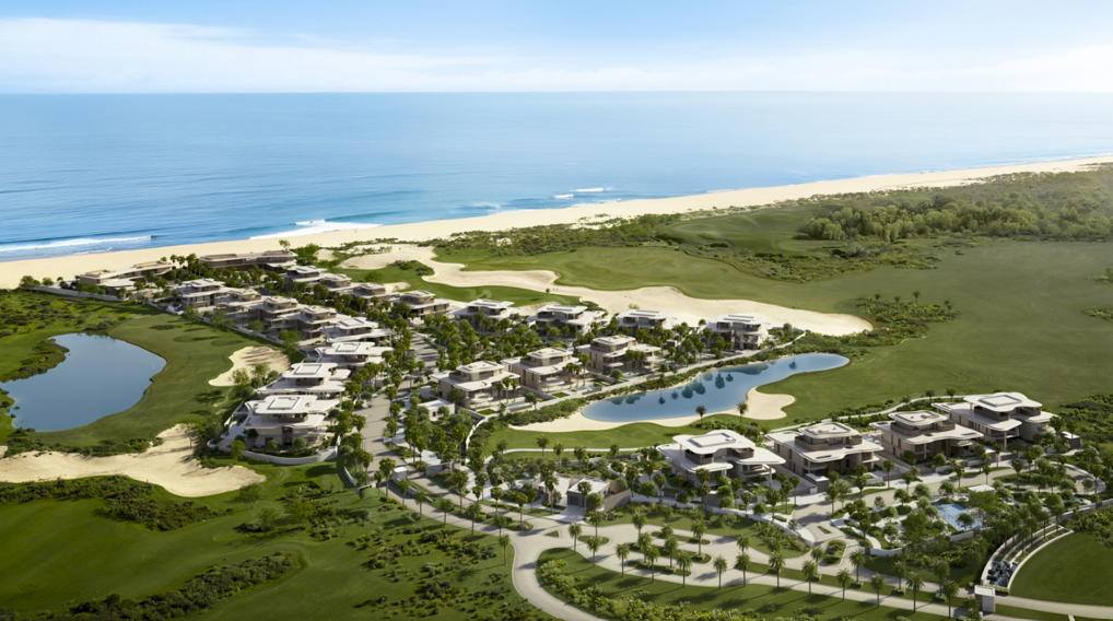 Sunset view over Faya Al Saadiyat community with beachfront access and Saadiyat Island skyline in the background